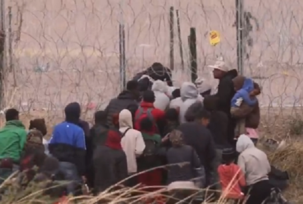 VIDEO: Border Crosser Caught Cutting Wire To Lead Dozens Over